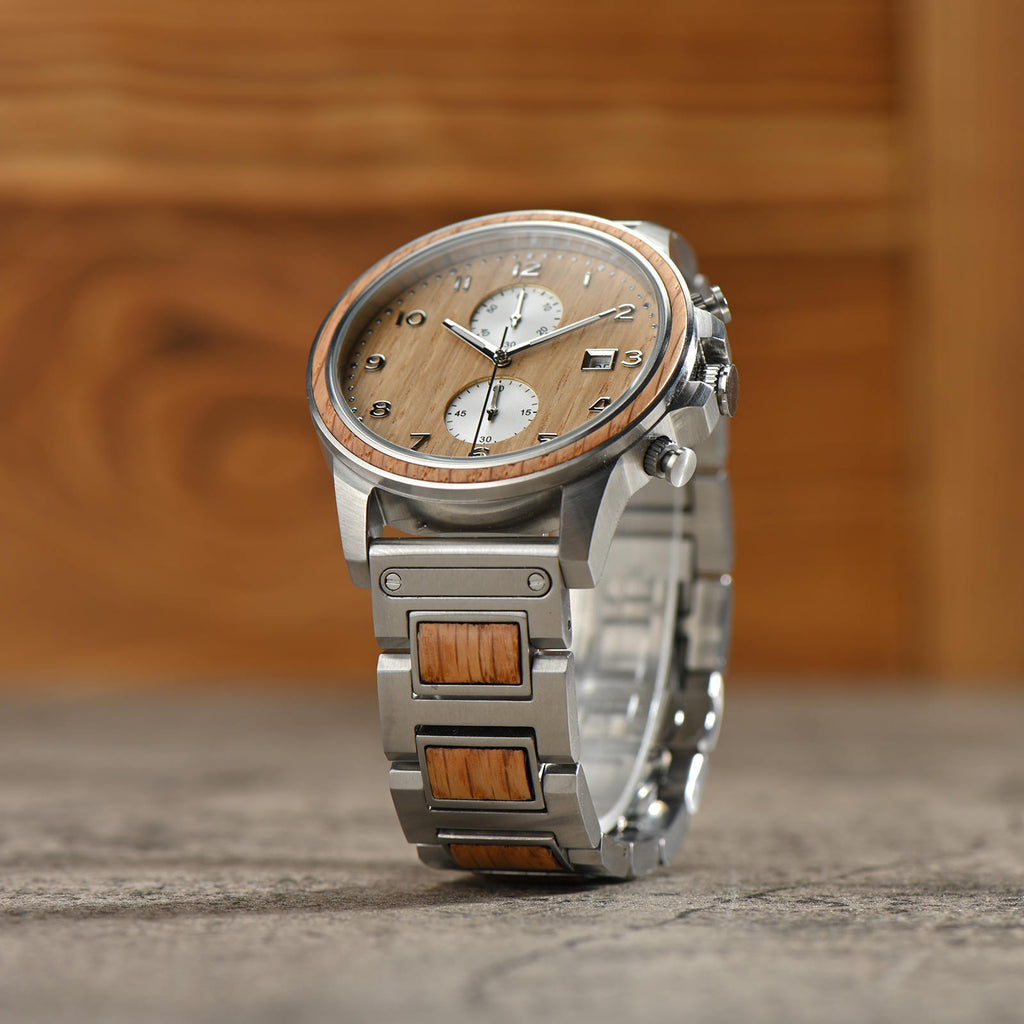 Barrel whiskey wood watch displayed from a unique angle on concrete table top