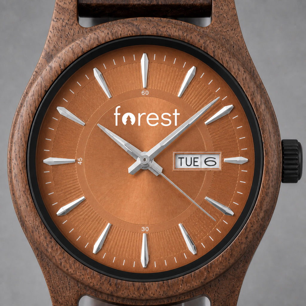Close view of the Bracken copper dial, day-date window and forest mark