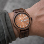 Bracken wooden watch worn on a wrist in daylight