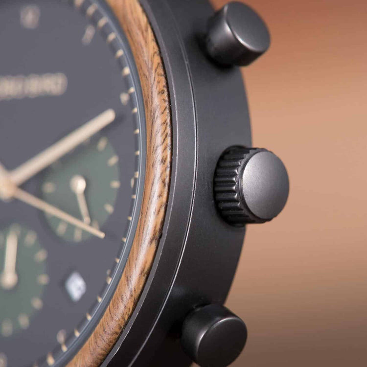 close up of dials on wooden watch hunter series