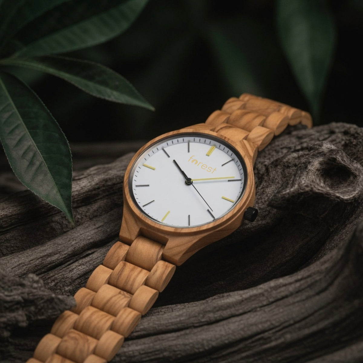 Dawn wooden watch at a three quarter angle on weathered driftwood