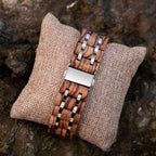 EMBER watch clasp and zebrawood strap on cushion
