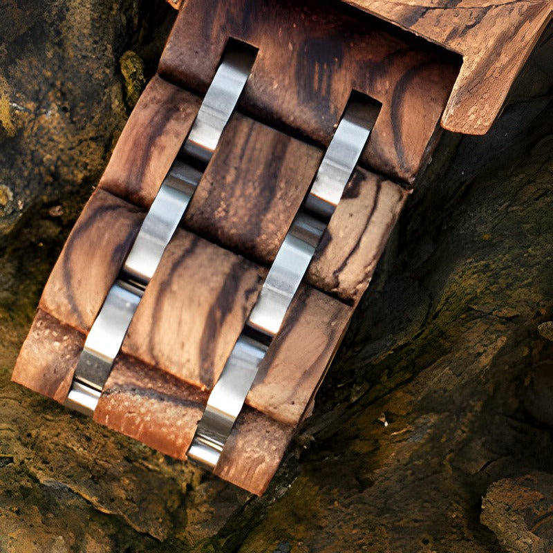 EMBER zebrawood and steel link strap on rock