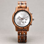 Front view of the Ember wooden watch with silver chronograph dial and pale gold Forest logo