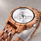 Close-up of the Ember watch silver chronograph dial and wooden case