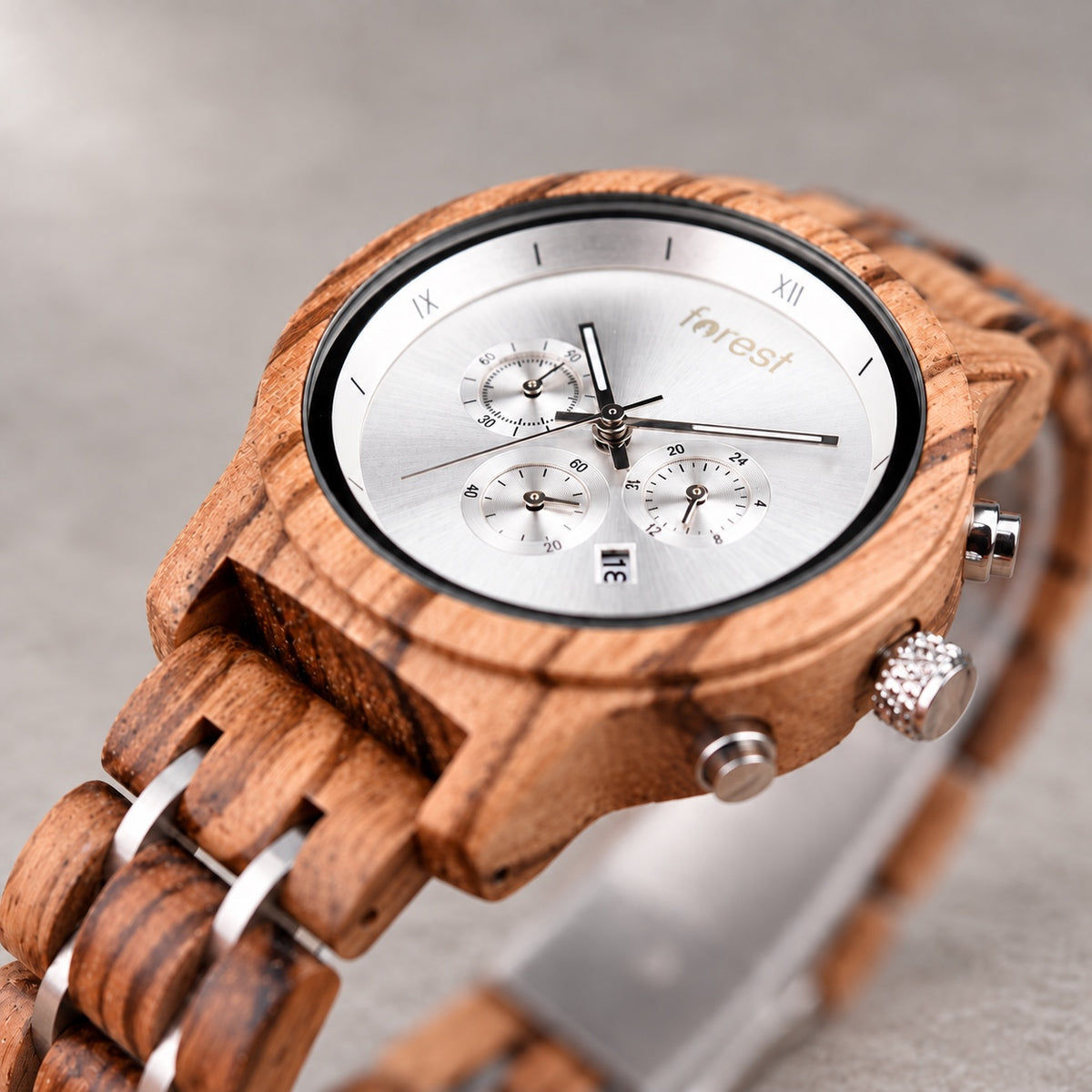 Close-up of the Ember watch silver chronograph dial and wooden case