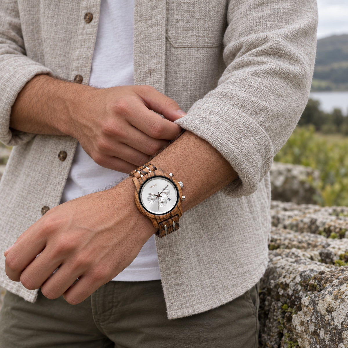 Ember wooden watch and bracelet worn outdoors with a light overshirt