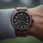 Raven wooden watch, worn on the wrist