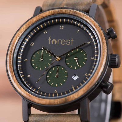 close up of a forest hunter watch, wooden mahogany detailing around the face of watch
