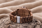 Windsor wooden caseback with four screws and an example message engraved in script