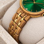 Close view of the Ivy slim olivewood bracelet with two narrow gold rails