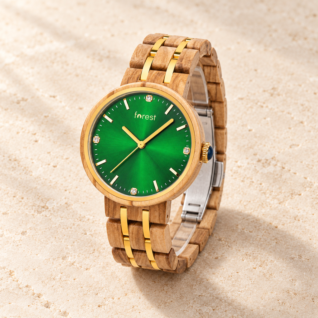 Complete Ivy watch at a three-quarter angle on warm ivory stone, with its bracelet and silver clasp visible
