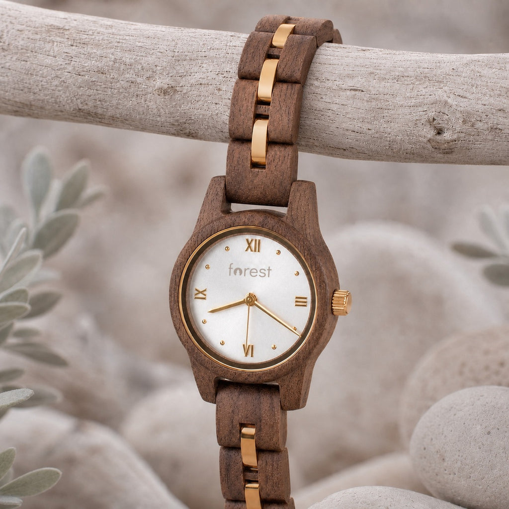 White dial Midnight wooden watch hanging from a driftwood branch