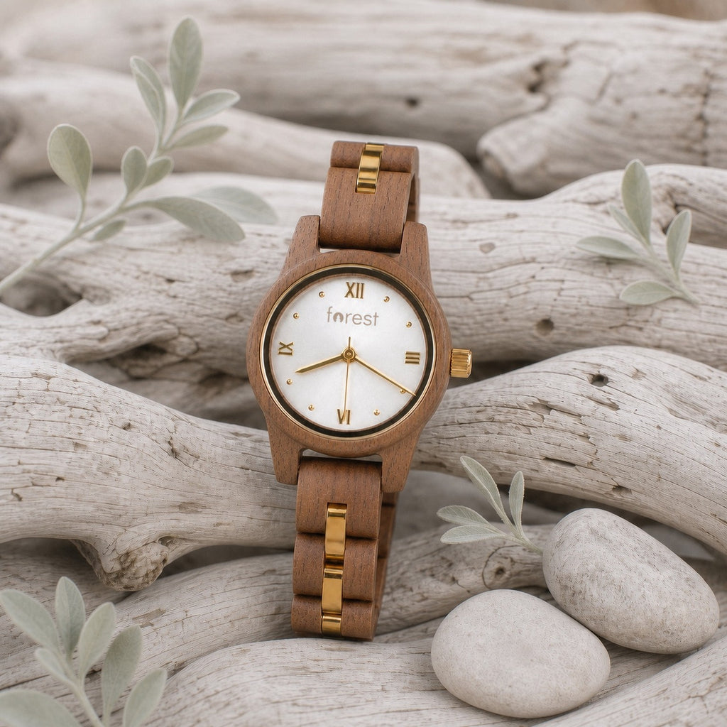 White dial Midnight wooden watch among pale stones and sage leaves
