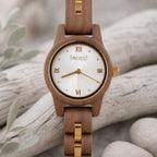 White dial Midnight wooden watch upright, walnut case and white dial with gold numerals