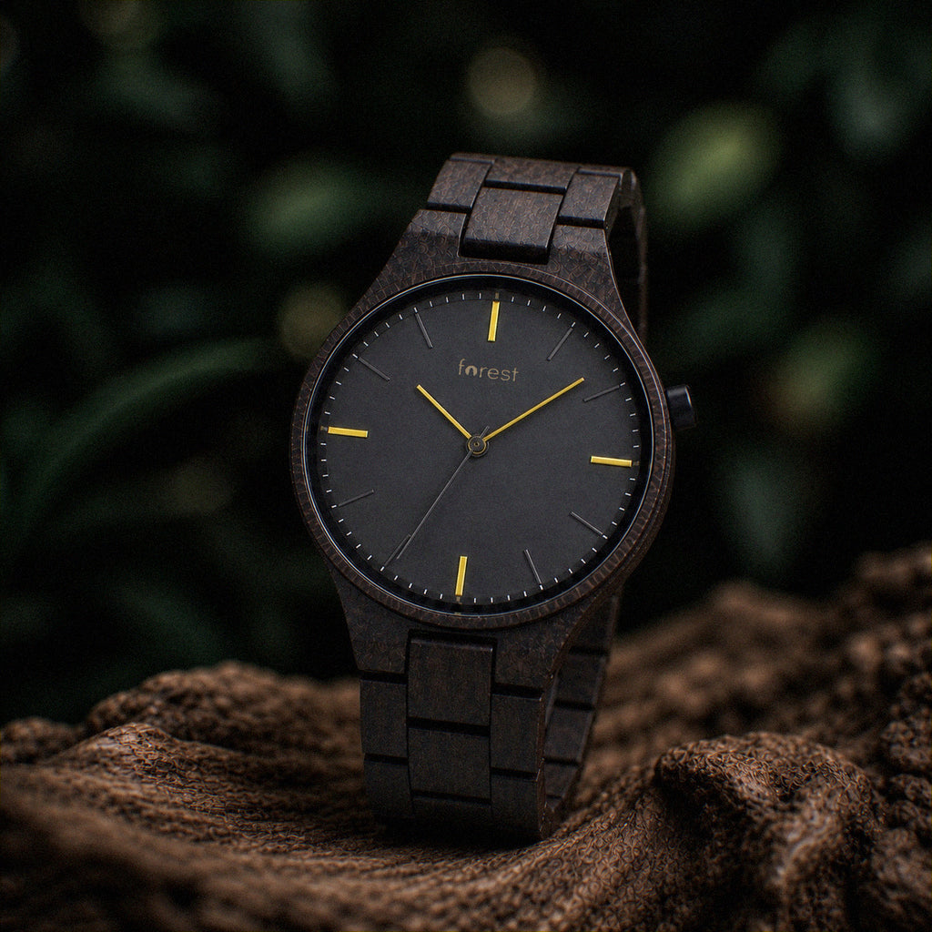 Nightfall wooden watch, close view of the charcoal dial and yellow markers
