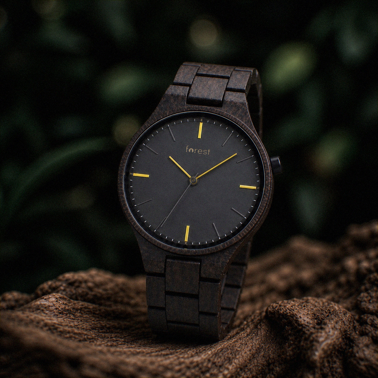 Nightfall wooden watch, close view of the charcoal dial and yellow markers