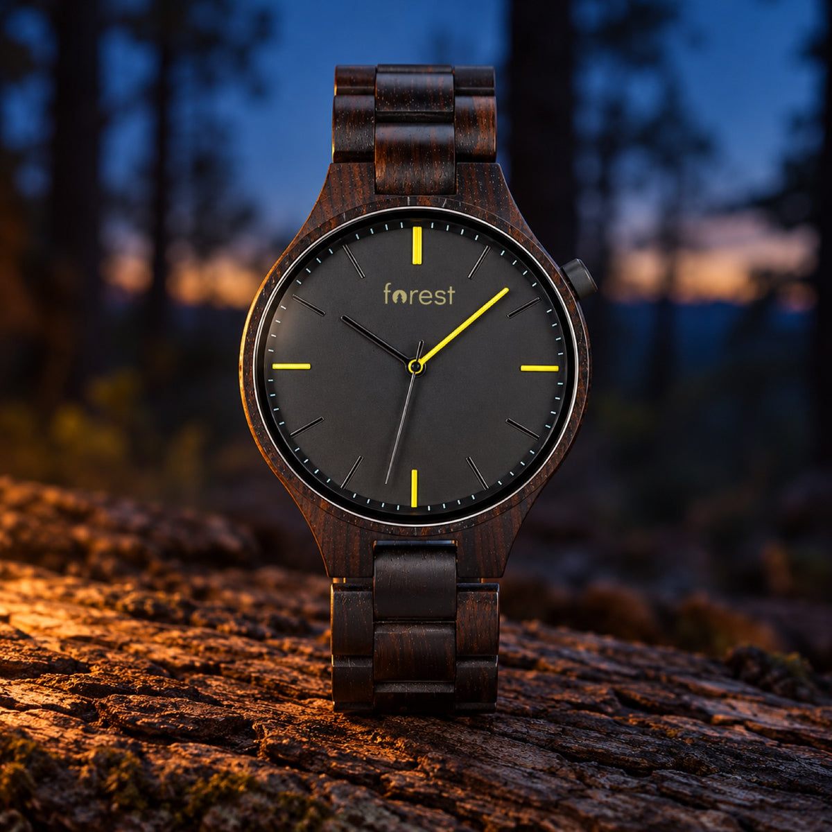 Nightfall ebony watch standing on a log at blue hour