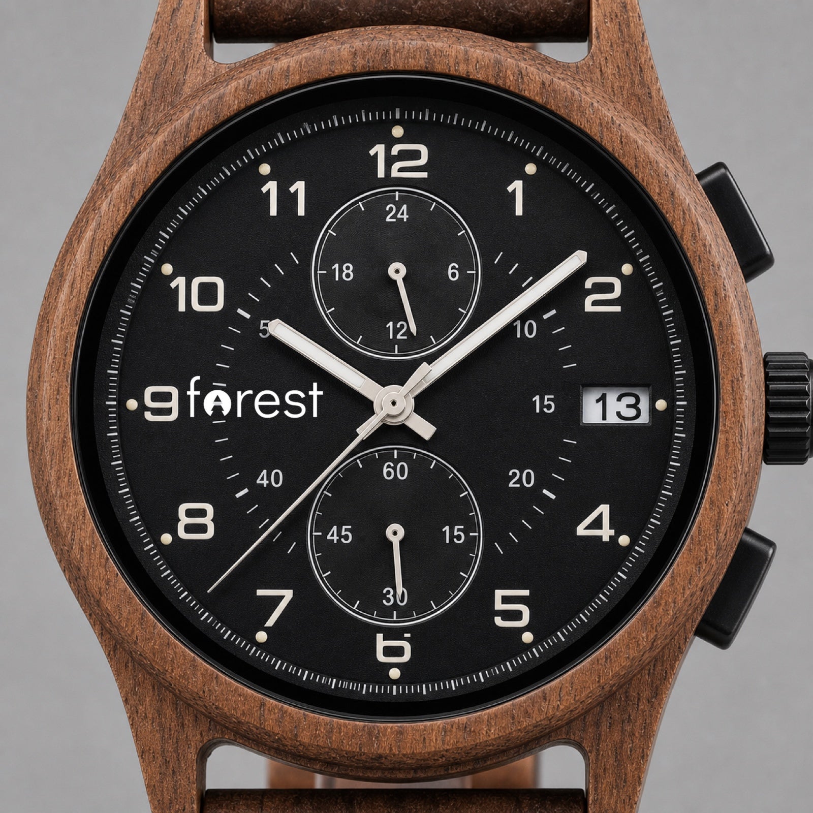 Close view of the Raven black dial, twin sub-dials and date window
