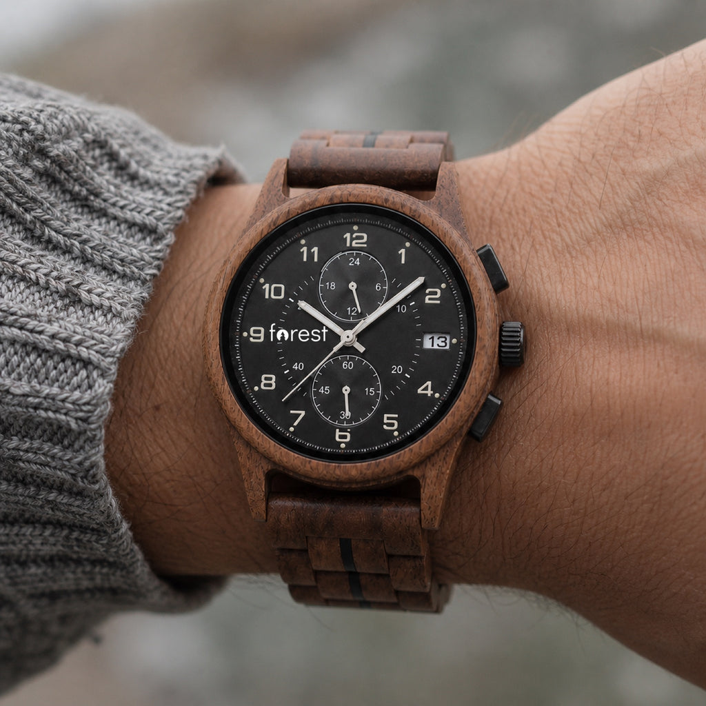 Raven wooden watch worn on a wrist in daylight