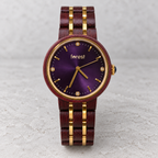 Royal rosewood watch with a purple sunburst dial and gold details on cool grey stone