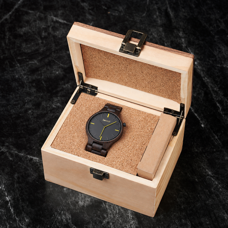 Nightfall wooden watch resting in its included pale wooden gift box