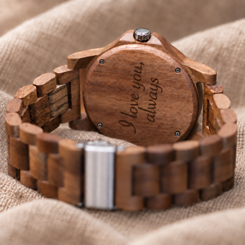 Windsor wooden caseback with four screws and an example message engraved in script