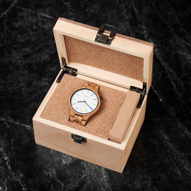 Dawn olivewood watch resting in its included pale wooden gift box