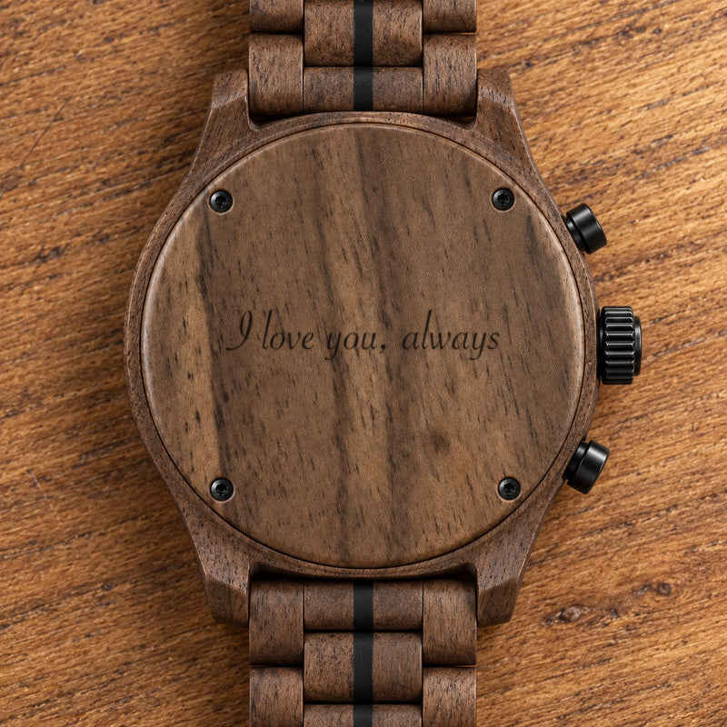 Walnut back of the Raven watch with its bracelet, engraved with a message