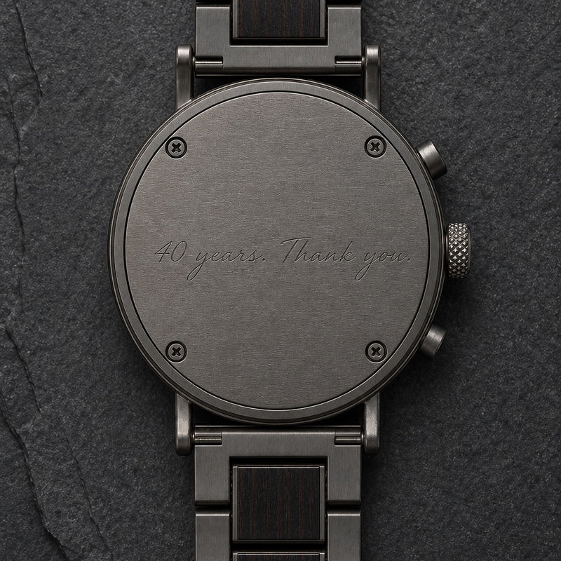 Engraving example reading 40 years. Thank you. on a watch back selected for BRACKEN