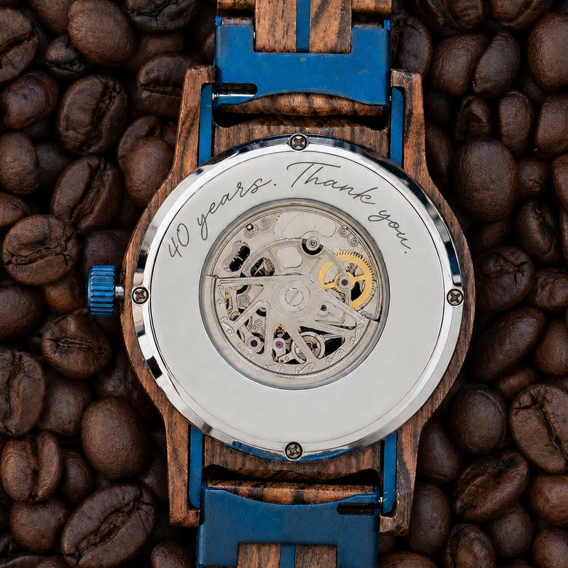 Engraving example reading 40 years. Thank you. on a watch back selected for RIVERSTONE